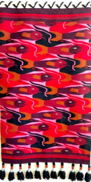 Eye-catching wool wall hanging with a pattern of fish and geese.