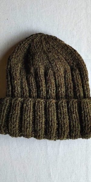 Practical Wool Beanie, is hand-knitted and fits snugly for maximum warmth.