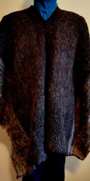 Wool hand-woven Poncho made with pure dark colored yarn.