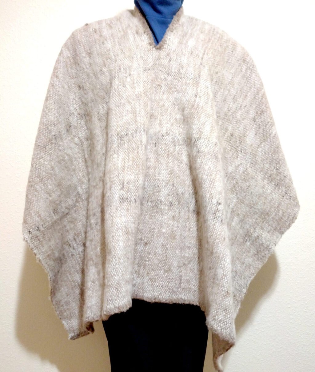 Wool winter poncho made with 100% hand-woven sheep wool in beige