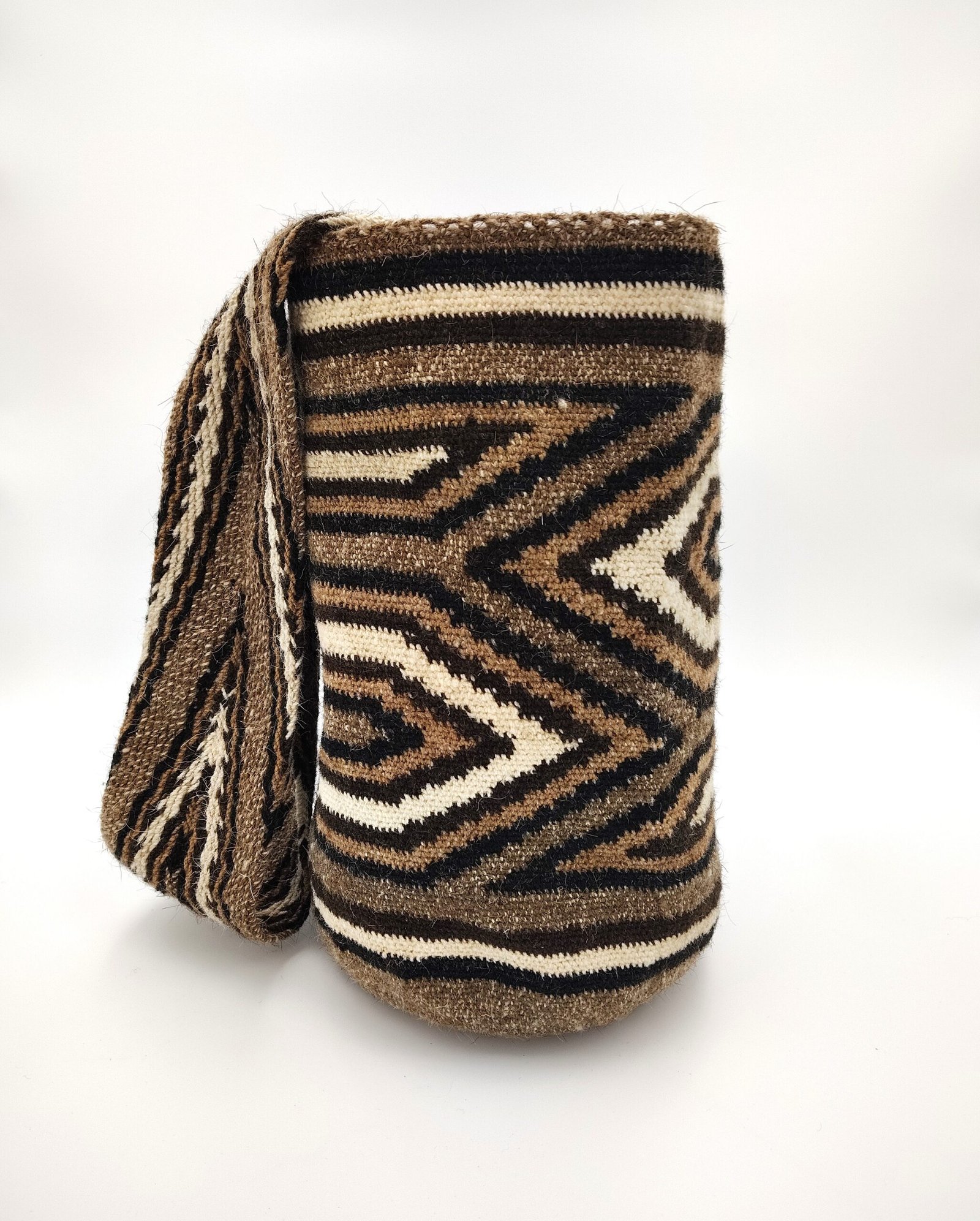 Arhuaca Woven Bag Wool Arhuaca handbag tightly woven with brown, black, and white yarns.